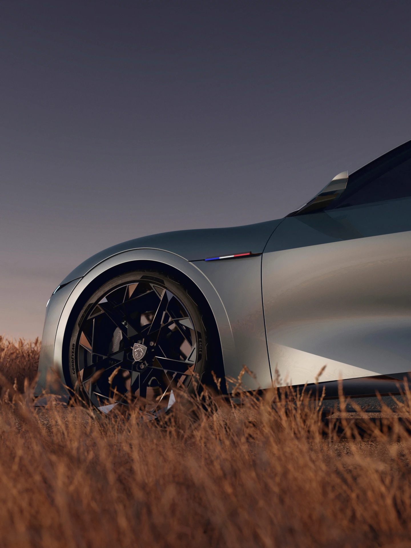 Detalle lateral del PEUGEOT RCZ Vision Concept que destaca la rueda delantera, el emblema y las líneas esculpidas